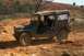 Nate navigating Bleddyn in their M151A Mutt through the winding Blind Man's Bluff course.  And yeah,...